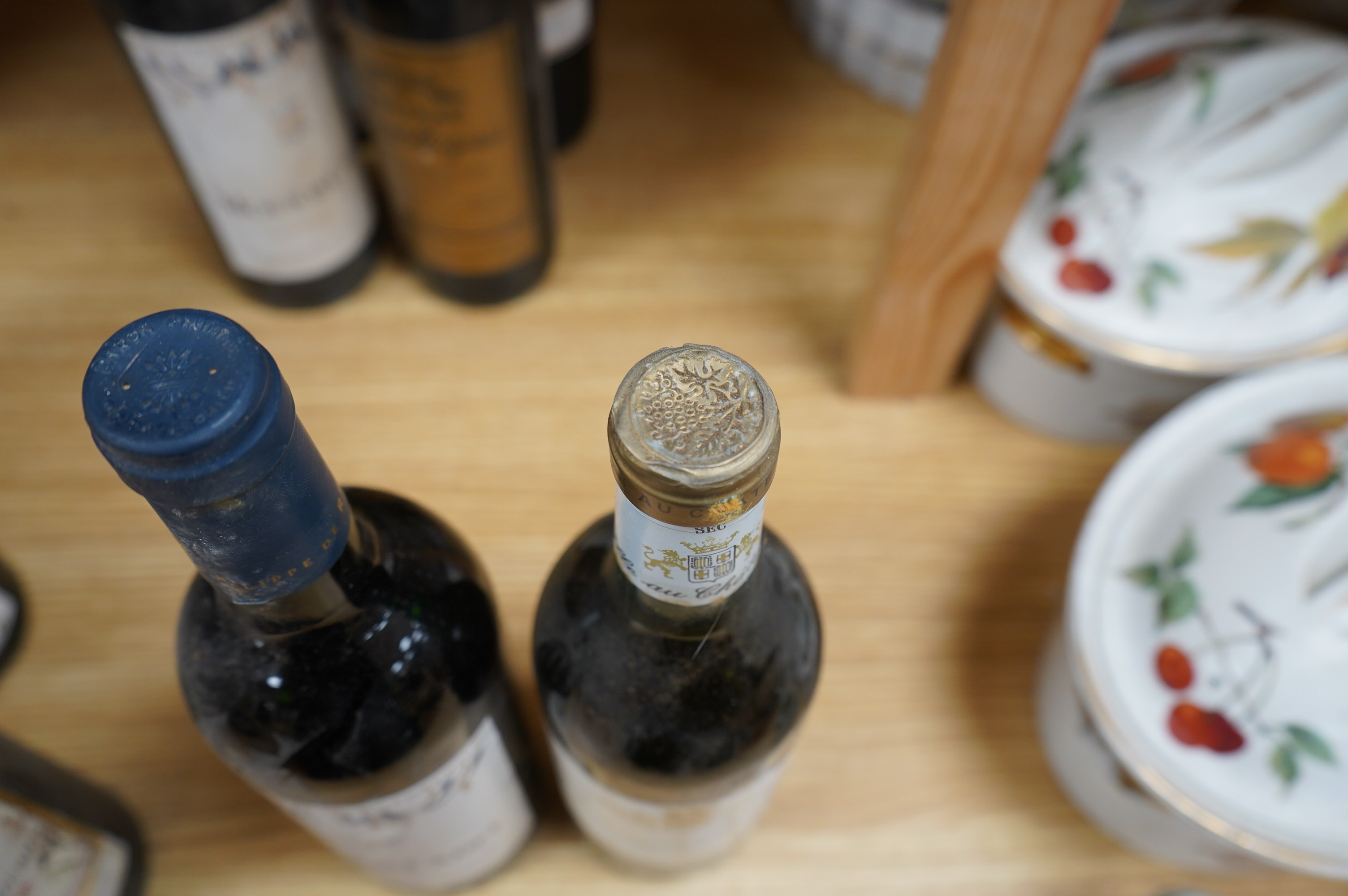 Twelve bottles of mixed red and white wine; a bottle of Chateau d’Ardennes 1989, a bottle of Chateau Chouteau, 1997, Lussac - Saint - Emilion, and two bottles of Chateau Langoa Barton, Saint Julien 1993 (12). Condition -